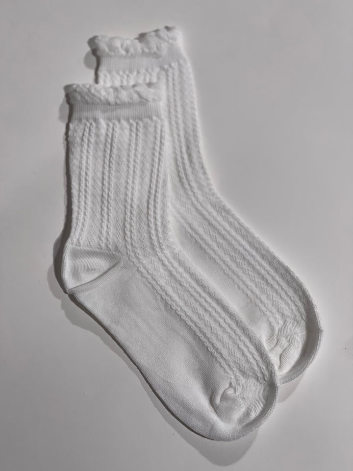 Baltos kojinytės